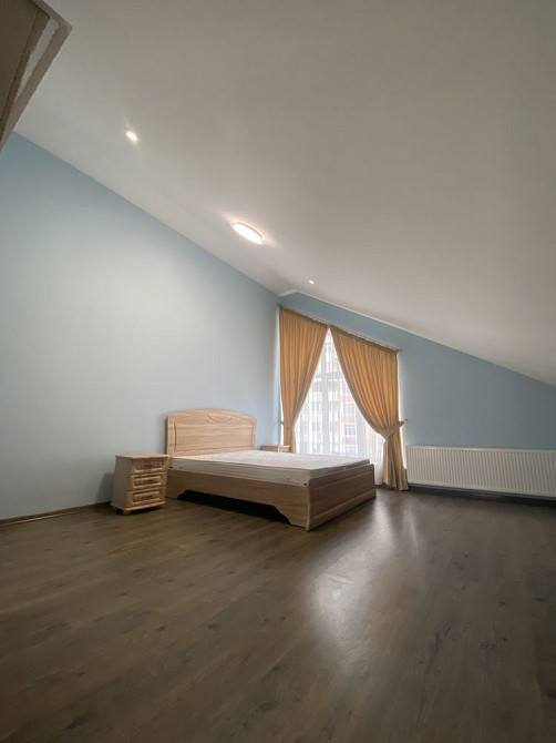 Центр Бучі! Простора квартира на мансарді (5 поверх) Буча - изображение 6