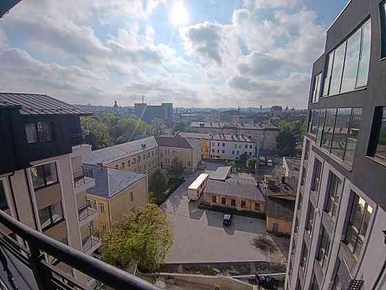 Продаж 3-кімнатної дворівневої квартири з мансардою на вул. Пекарська Львов