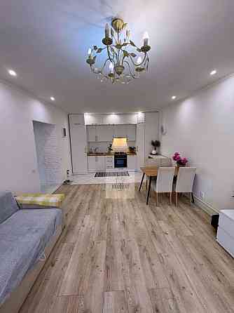 Продам стильну 2-кімнатну квартиру з ремонтом та меблями.нова будова 1 Кам`янець-Подільський