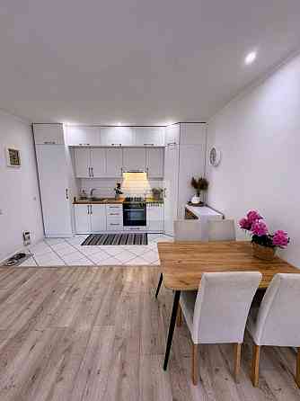 Продам стильну 2-кімнатну квартиру з ремонтом та меблями.нова будова 1 Кам`янець-Подільський