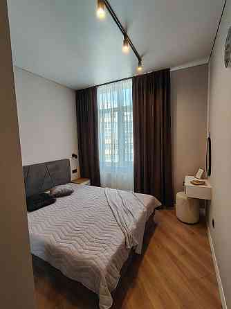 Кухня-студия и спальня в ЖК " 60 Жемчужина"/ Краснова Одеса