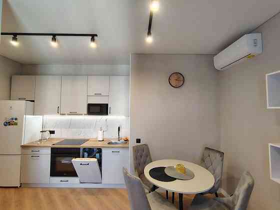 Кухня-студия и спальня в ЖК " 60 Жемчужина"/ Краснова Одеса