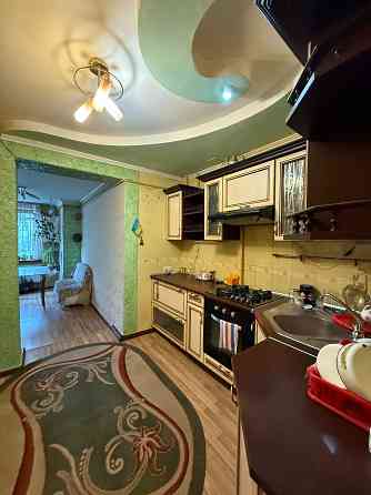 Унікальна 5+кімнатна квартира з гаражем, 2 кухнями та окремим входом Івано-Франківськ