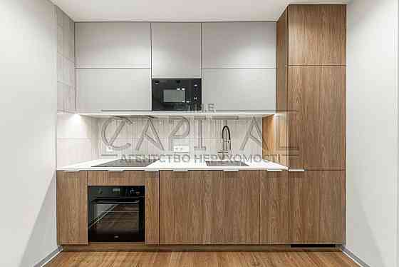 Дизайнерська квартира з терасою та повною комплектацією в «Файна Таун» Киев