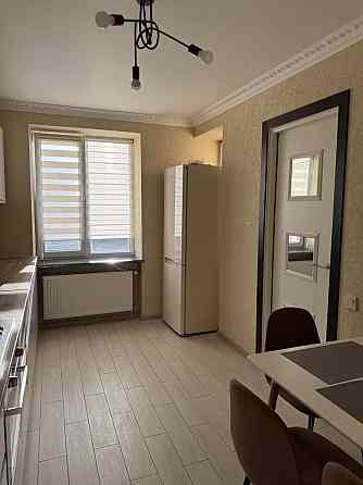 Продаж двоярусна квартира з сучасним ремонтом у відмінному стані Кам`янець-Подільський